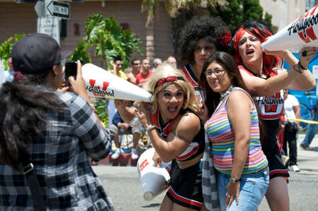 Men cheerleading during the Long Beach Lesbian and Gay Pride Parade 2012