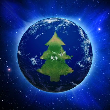 Planet Earth with Christmas tree shaped continents and clouds over a starry sky.の写真素材