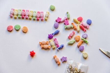 Flat lay of bead pieces, bracelet and necklace for kids