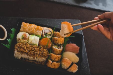 Raw fresh Salmon sushi roll maki - japanese food.の写真素材