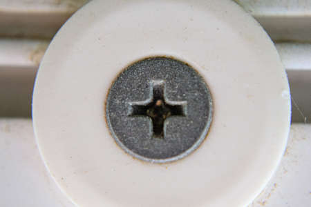 The screw head on white background