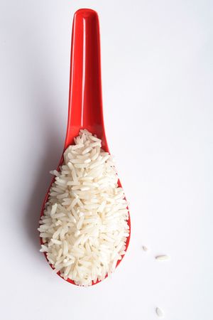 spoon with riceの写真素材