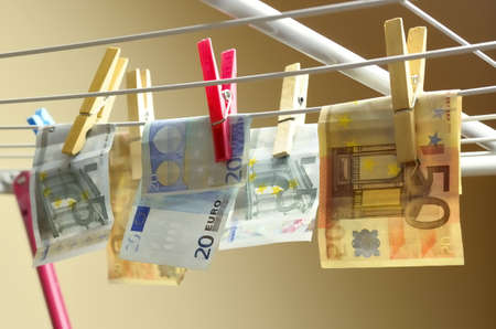 A grocer with euro notes, symbolizing money laundering 