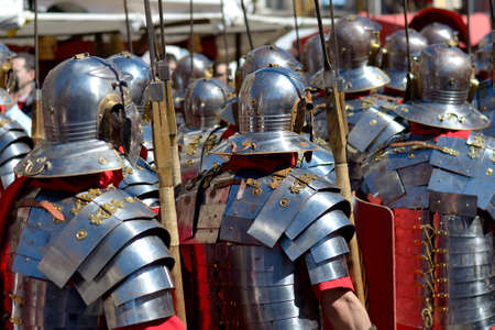 A group of Roman soldiers parading down the street at Easter.