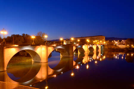 Dusk on the stone bridge on the river Ebroの写真素材
