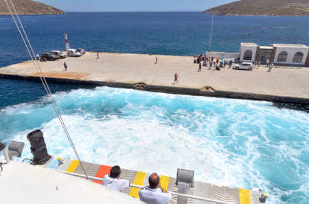 Serifos Island, Greece - June 2, 2013  A ferry company  Aegean Speed Lines  makes docking maneuvers in the port of Serifos island のeditorial素材