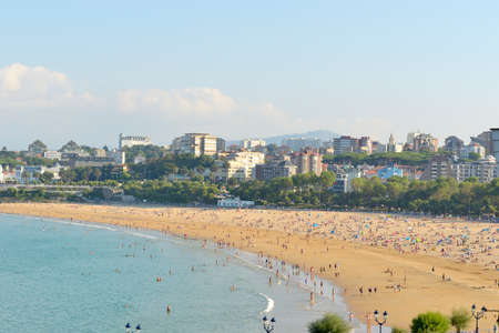 Santander, Spain - August 31, 2013  The Sardinero Beach is one of the most popular in Northern Spain, where many tourists and locals, enjoying the waves on sunny summer days のeditorial素材