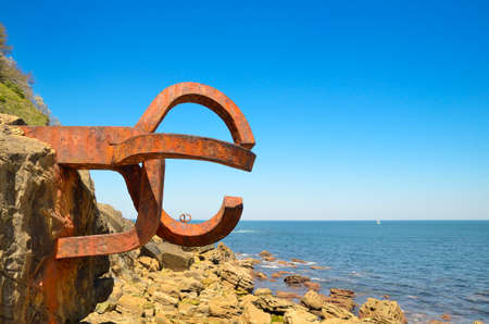 San Sebastian, Spain - May 18, 2014  The Comb of the Wind is a collection of sculptures by Eduardo Chillida  Consists of three sculptures of steel, 10 tons each, embedded in the rocks overlooking the Cantabrian Seaのeditorial素材