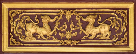 Thai traditional sculpture in Buddhist temple, Kochasri  mixed god animal between lion and elephant...