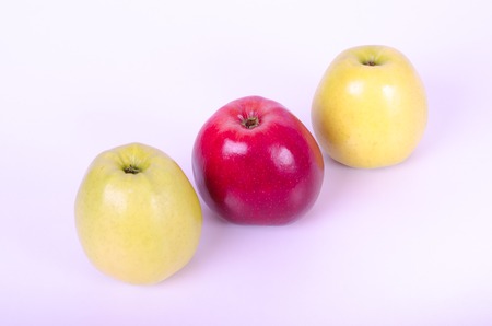Tasty red and yellow apples isolated on white backgroundの写真素材