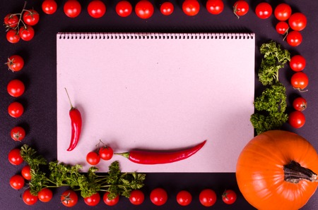Fresh vegetables on a black table. Frame, textの写真素材