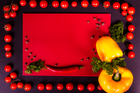 Fresh vegetables on a black table. Frame, textの写真素材