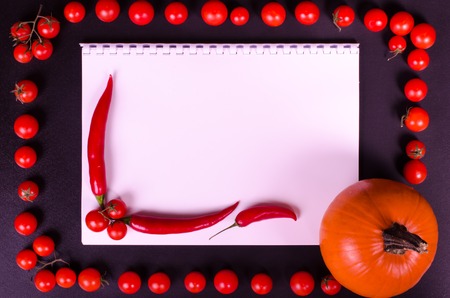 Fresh vegetables on a black table. Frame, textの写真素材