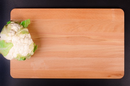 Organic fresh cauliflower on wooden background. Autumnの写真素材