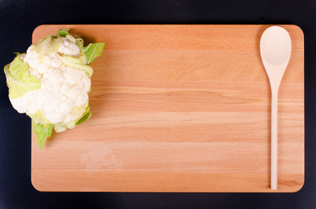 Organic fresh cauliflower on wooden background. Autumnの写真素材
