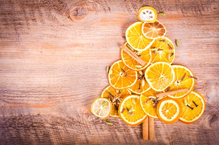 Christmas tree made of dried oranges, cinnamon and anise. Viewed from above.の写真素材