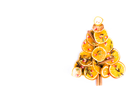 Christmas tree made of dried oranges, cinnamon and anise. Viewed from above.の写真素材