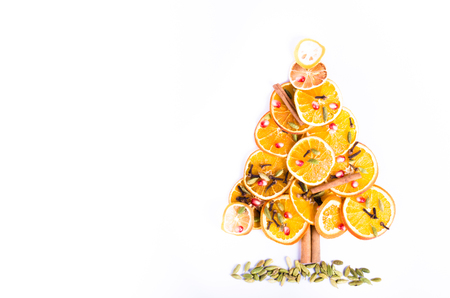 Christmas tree made of dried oranges, cinnamon and anise. Viewed from above.の写真素材