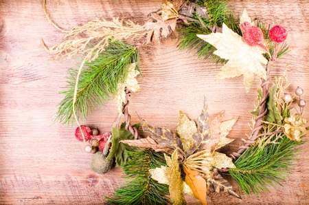 Christmas snowy wreath, New Year decoration on wooden. Free space for textの写真素材