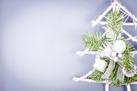 Christmas snowy tree, New Year decoration on wooden. Free space for textの写真素材