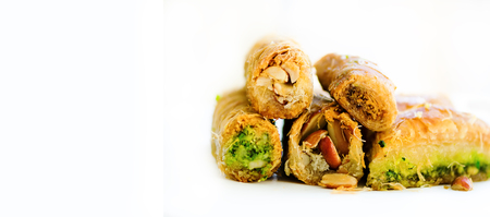 Middle eastern dessert baklava on white background. Free space for your text. Bannerの写真素材