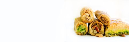 Middle eastern dessert baklava on white background. Free space for your text. Bannerの写真素材