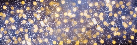 Festive glittering christmas lights. Blurred abstract background with bokeh. Copy space. Bannerの写真素材