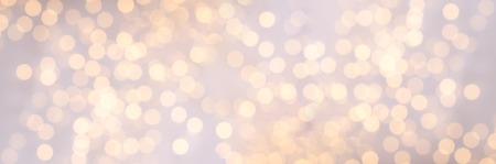 Festive glittering christmas lights. Blurred abstract background with bokeh. Copy space. Bannerの写真素材