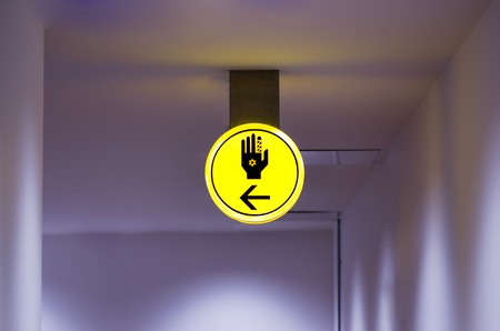 Toilet, wc for hassid (religious Jew) sign. Bright yellow symbol on dark background. Copy space