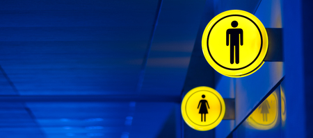 Male, female toilet, restroom sign. Man and woman equality concept. Copy space. Bannerの写真素材