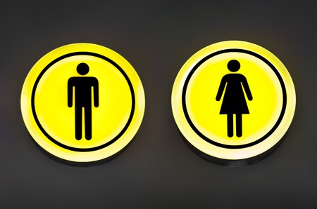 Male, female toilet, restroom sign. Man and woman equality concept. Copy spaceの写真素材