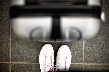 Aerial top view with copy space. White sneakers and travel suitcase.の写真素材