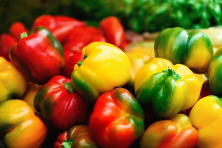 Fresh vegetables red, yellow, green bell peppers. Food frame and background.