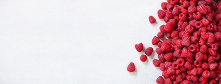 Fresh organic raspberries. Fruit background with copy space. Summer and berries harvest concept. Vegan, vegetarian, raw food. Banner.の写真素材