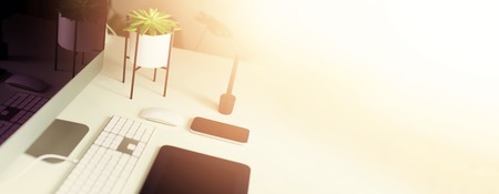 Keyboard, mouse, computer display with black blank screen. Front view. Designer workspace on grey background. Minimalistic home office. Copy space. Bannerの写真素材