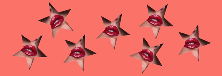 View of bright lips with glitter through hole in paperの写真素材