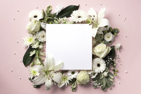 Creative layout with white flowers, square shape paper for copy space over pinkの写真素材