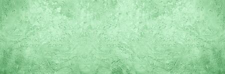 Abstract cement concrete background. Grunge texture, wallpaper. Trendy mint color of year 2019. Top view, copy space. Banner.の写真素材