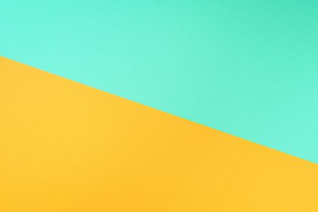 Colorful trendy green and yellow paper background. Top view. Copy spaceの写真素材