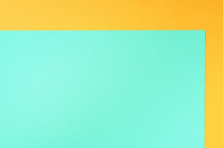 Colorful trendy green and yellow paper background. Top view. Copy spaceの写真素材