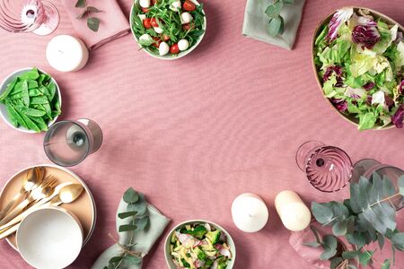 Valentine day, Women's Day, mother's day, wedding brunch, festive family lunch and dinner. Spring food table setting on pink background. Vegan, vegetarian concept. Top view.の写真素材