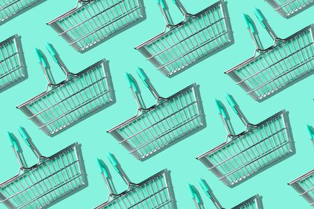 Pattern of supermarket shopping basket on trendy green background. Creative design for packaging. Online shopping. Seamless pattern. Black friday sale concept. Sustainable and minimalist lifestyle.の写真素材