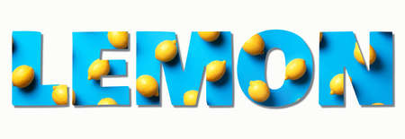 Inscription Lemon made with lemons on blue paper background. Top view. Food pattern. Text for your design. Summer concept. Vegan and vegetarian diet. Bannerの写真素材