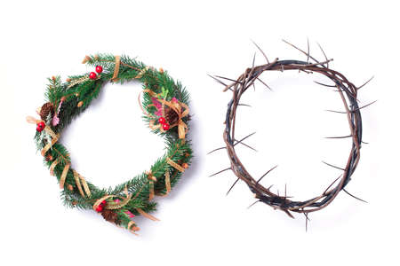 Christmas wreath and crown of thorns on white background. Remember the real Reason of the Season. Christian Christmas and Easter concept. Jesus Christ born to Die, born to Rise. Messiah, Emmanuel.の写真素材