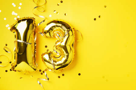 Gold foil balloon number, digit thirteen. Birthday greeting card, inscription 13. Anniversary...