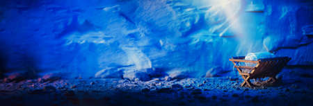 Birth of Jesus Christ. Jesus is reason for season. Salvation, Messiah, Emmanuel, God with us, hope. Wooden manger and star of Bethlehem in cave, nativity scene background. Christian Christmas conceptの写真素材