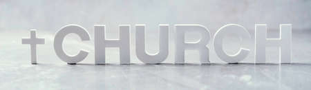 Word Church made with cement letters and cross on grey marble background. Copy space. Biblical,...