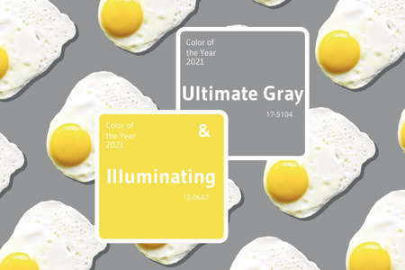 Egg pattern, food concept. Demonstrating trendy Color of the Year 2021. Illuminating Yellow and Ultimate Gray.の写真素材