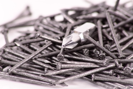 Screw Driver Head in Pile of Nails