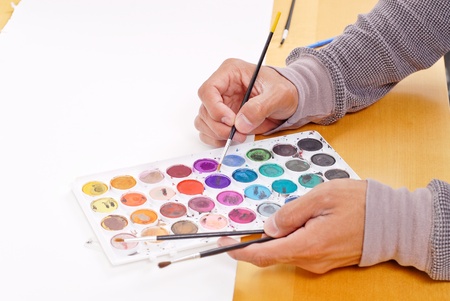 Artist Choosing a Color